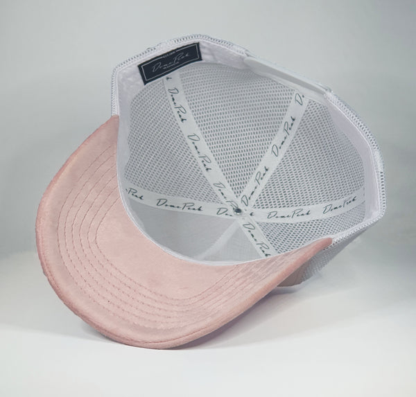 DomePeak Headwear pink suede baseball cap. Supported with a snapback to fit all sizes. Inside angle of the cap.