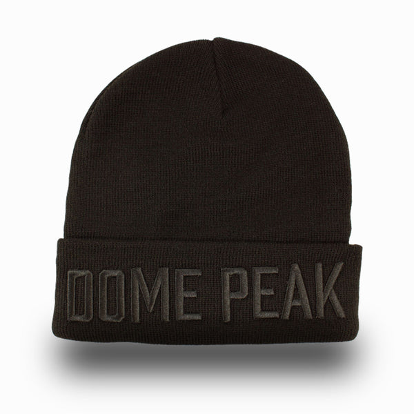 DomePeak Bold, black on black beanie cap. 100% acrylic beanie. Winter wear. Front angle of the cap.