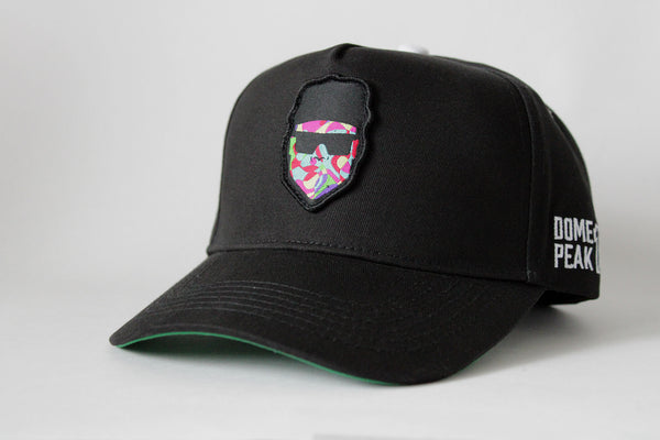 DomePeak Headwear baseball cap. Supported with a snapback to fit all sizes. Front angle of the cap.